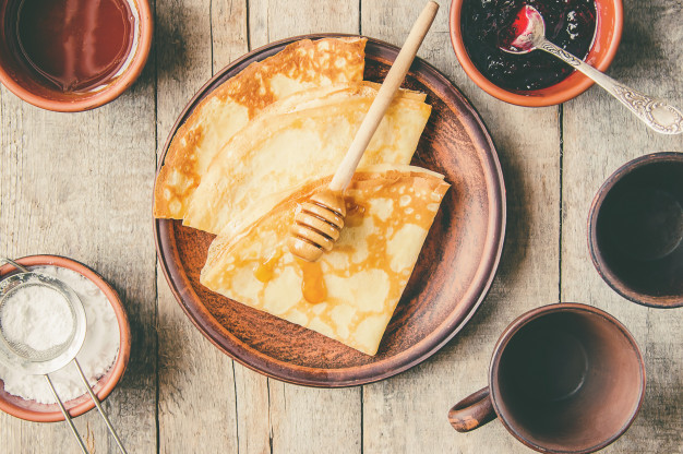 crepes-are-homemade-pancakes-selective-focus-food_73944-6212